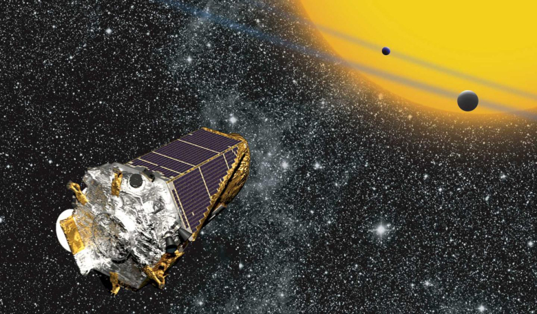 Artist's conception of Kepler telescope observing planets transiting a distant star. Image: NASA Ames/ W Stenzel