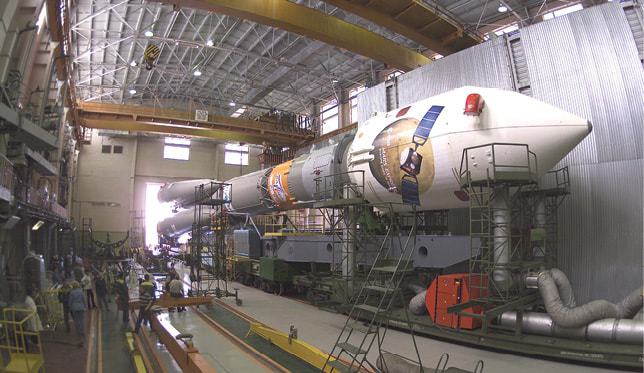 Soyuz-launch-vehicle-in-the-assembly-hall-at-Baikonur-cosmodrome.jpg