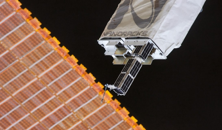 Planet Labs’ Dove satellites being deployed from the NanoRacks CubeSat Deployer on the ISS in February 2014.