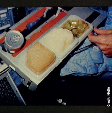 Above right: ’Meal A’ for a Gemini mission of the mid 1960s: hand wipe and food cubes are on the right and fruit juice is in the centre.