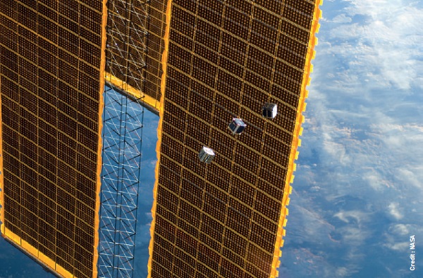 Tiny satellites called CubeSats are jettisoned from the International Space Station