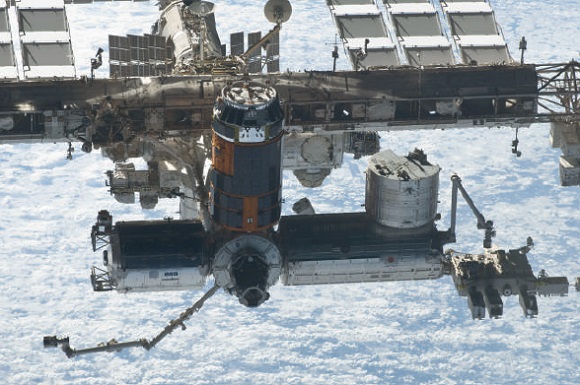 Seen at the bottom right, the experimental module Kibo is the largest on the International Space Station