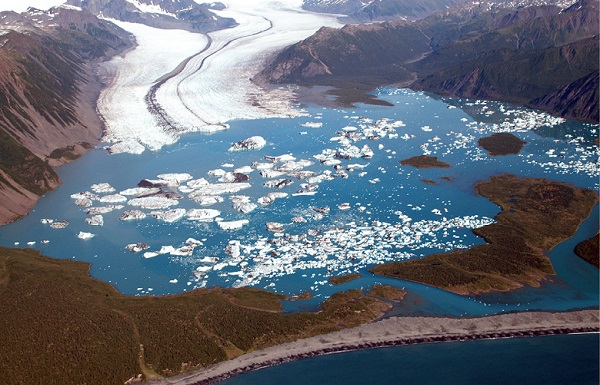 Climate change - an oblique aerial photograph showing the terminus of Bear Glacier, Kenai Mountains, Kenai Fjords National Park, Alaska, which is under continuous retreat