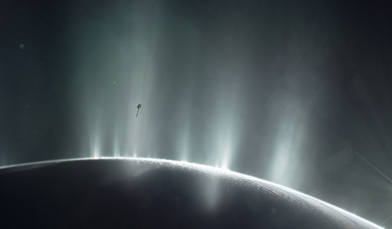 An artist's rendering showing Cassini diving through the plume on Enceladus in 2015. Image NASA/JPL-Caltech