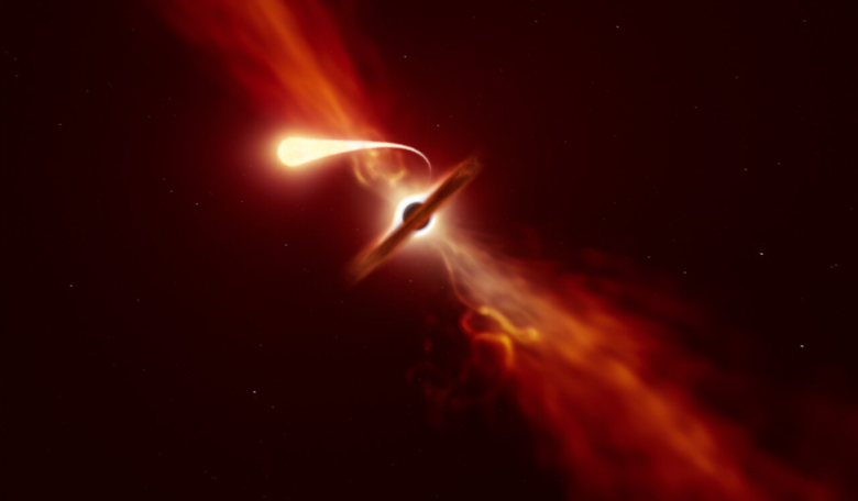 Artist’s illustration depicting a star (in the foreground) experiencing spaghettification as it’s sucked in by a supermassive black hole (in the background) during a ‘tidal disruption event’. Image: ESO/M. Kornmesser