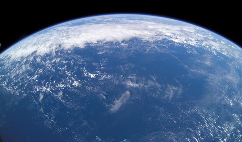 This view of Earth's horizon was taken by an Expedition 7 crewmember onboard the International Space Station, using a wide-angle lens while the Station was over the Pacific Ocean. Image: NASA