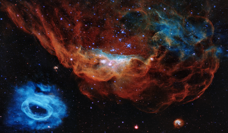 A colorful image resembling a cosmic version of an undersea world teeming with stars is being released to commemorate the Hubble Space Telescope's 30 years of viewing the wonders of space. Image: NASA, ESA and STScI