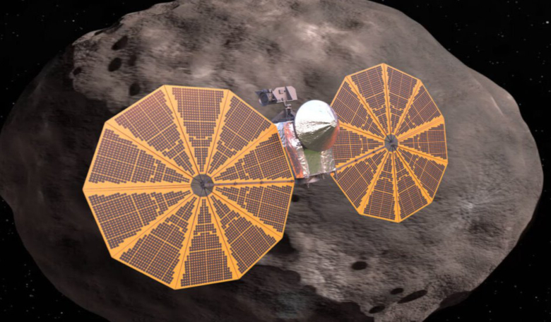 An illustration depicts NASA's Lucy spacecraft near an asteroid in the Trojan Belt area of the solar system. Image: NASA