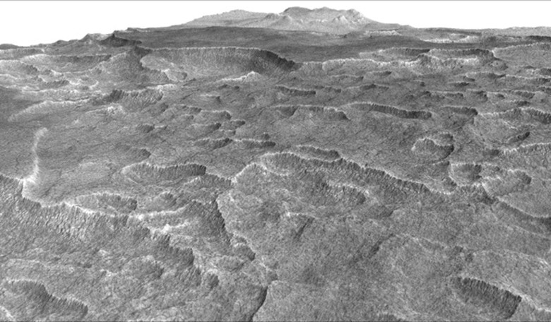 This vertically exaggerated view shows scalloped depressions in Mars' Utopia Planitia region. Image: NASA/JPL-Caltech/Univ. of Arizona