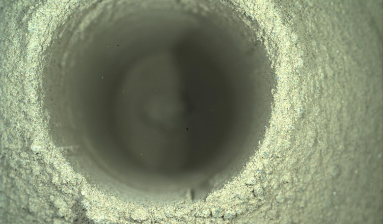 An incredible close-up photo from the WATSON camera on the Perseverance Rover. This sampling borehole is roughly 13 mm diameter. The image was taken on sol 165 at 20:29:35.617 (local mean solar time). Image: NASA/JPL