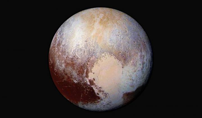 Pluto; The (dwarf/maybe not dwarf) planet with a heart. Should this enigmatic object be reclassified a planet again? UCF scientist Philip Metzger says yes based on his research. Image: NASA