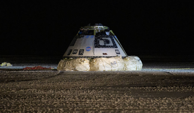 The Boeing CST-100 Starliner spacecraft is seen resting on its airbags after it landed in White Sands, New Mexico, at 7:58 a.m. EST on Sunday, 22 December 2019. Image: NASA