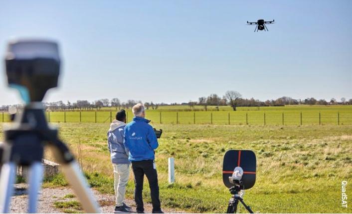 QuadSAT team operating drone on a test flight.