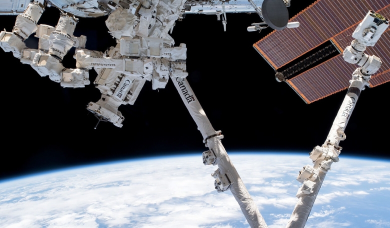 A view of Canadian space robots Canadarm2 and Dextre on the International Space Station in LEO.