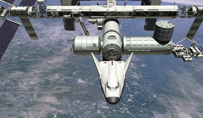The Shooting Star module adds a capability for NASA to send additional critical science, food and cargo to the International Space Station. Crew pass through Shooting Star to the forward portion where they can open the hatch into Dream Chaser.