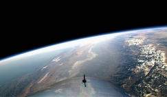 The view of Earth - seen here during Virgin Galactic’s first spaceflight - is similar for passengers with either Blue Origin or Virgin Galactic.