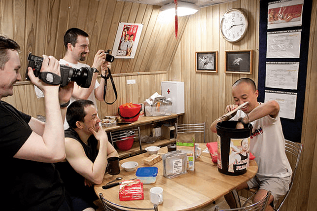 Crew members of Mars 500 enjoy the moment as Chinese crew member, Wang Yue