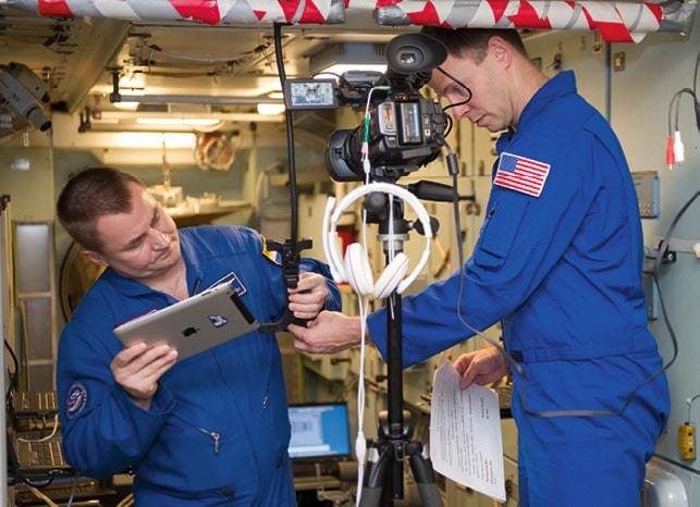 ISS-57 crew members Aleksey Ovchinin and Nick Hague using a Space Station simulator.