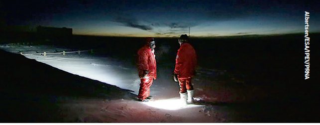 Two of the Concordia winter crew outside their base where temperatures can reach as low as minus 80C in the depths of winter