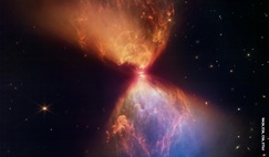 An hourglass-shaped, multi-colour cloud of dust and gas illuminated by light from a protostar, a star in the earliest stages of formation. The image was captured by NASA’s James Webb Space Telescope.