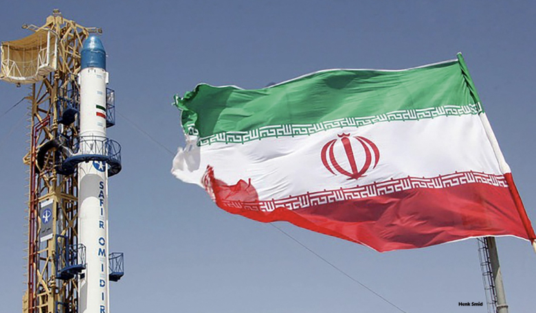 A Safir launcher and the Iranian flag.