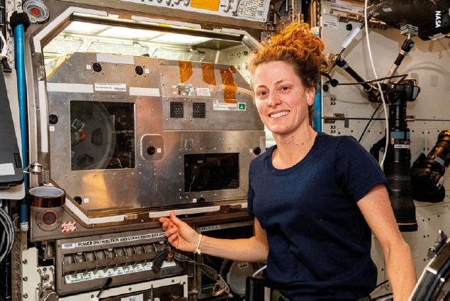 NASA astronaut Loral O Hara conducting Flawless Space Fibers operations in the MSG