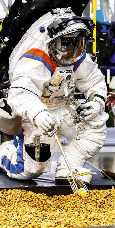 The white cover layer of the AxEMU spacesuit prototype as it is tested in the ARGOS