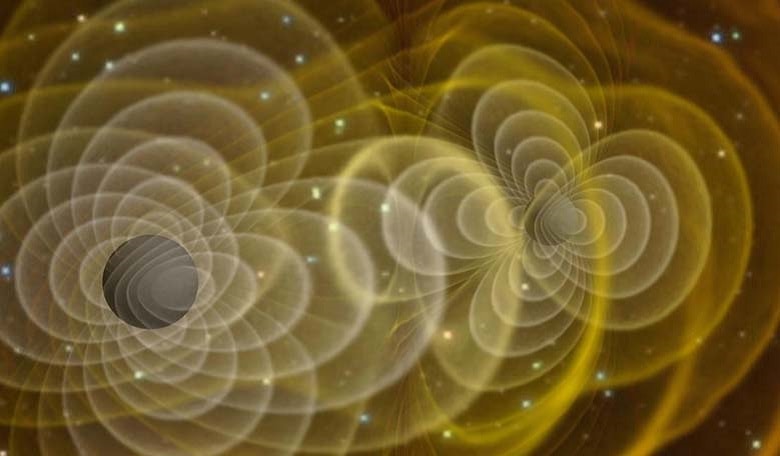 Illustration of gravitational waves produced by two orbiting black holes. Image credit: Henze/NASA