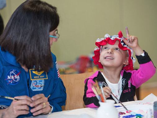 painting-with-a-young-patient-at-md-anderson.jpg